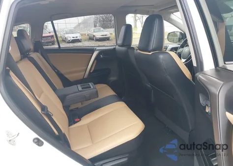 2016 Toyota Rav4 Hybrid Limited z USA, uszkodzony, nr VIN JTMDJREV1GD005945